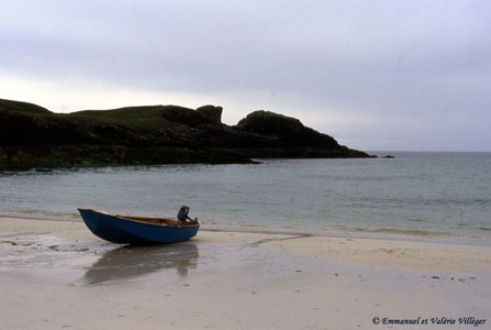 Beach at Clachtoll with its particular rock
