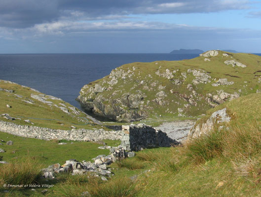The wall of Eilean Glas lighthouse and views towards the Shiant islands